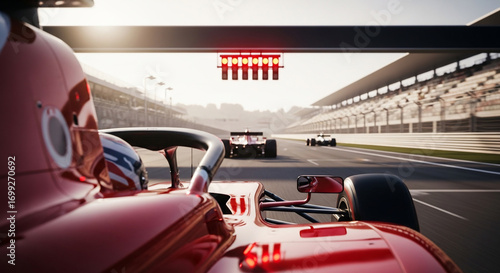 Red Racing Car on Track at Start Line, Red Lights Illuminated