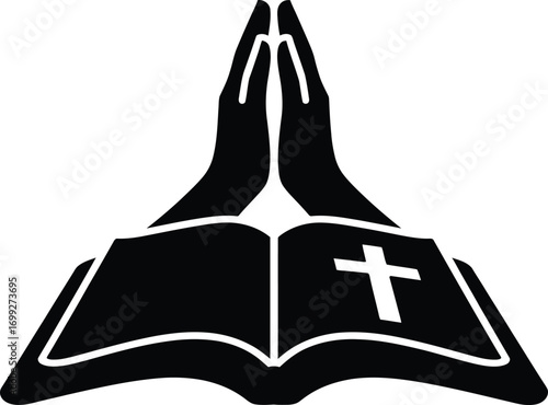Silhouette of open bible with praying hands and cross symbol