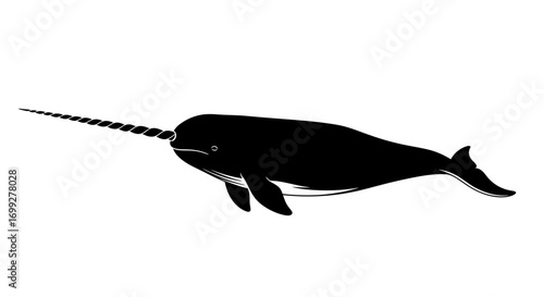 Silhouette of a narwhal with a long spiral tusk