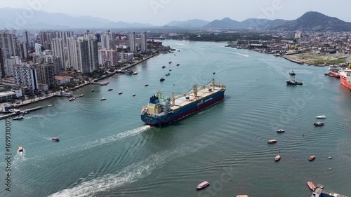 Freight Ship At Santos In Sao Paulo Brazil. Port Of Santos Scenery. Cargo Ship. Maritime Transportation. Freight Ship At Santos. Freight Ship Sailing.