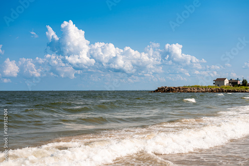 Wild meets civilization, vacation homes and shipping lanes pass by a small nature preserve in the Chesapeake Bay