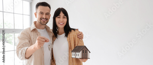 Young pregnant couple with ...