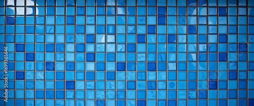 A wall covered in various shades of blue tiles, showcasing texture and subtle light variations,   building,  matte