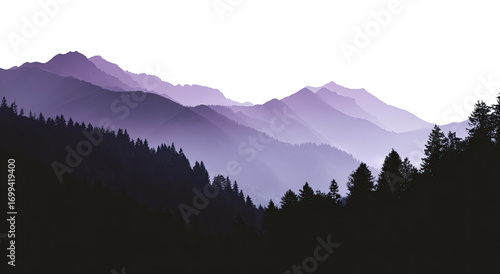 Misty purple mountain range with dark silhouettes of forests