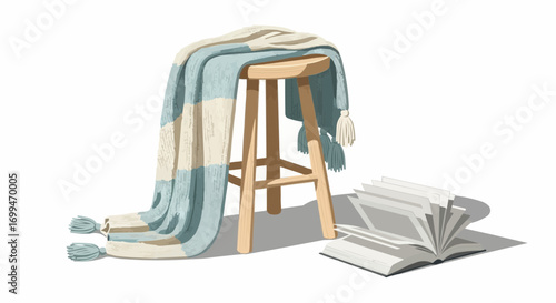 A cozy scene with a light blue and cream striped blanket draped over a wooden stool, next to an open book, on a white background.