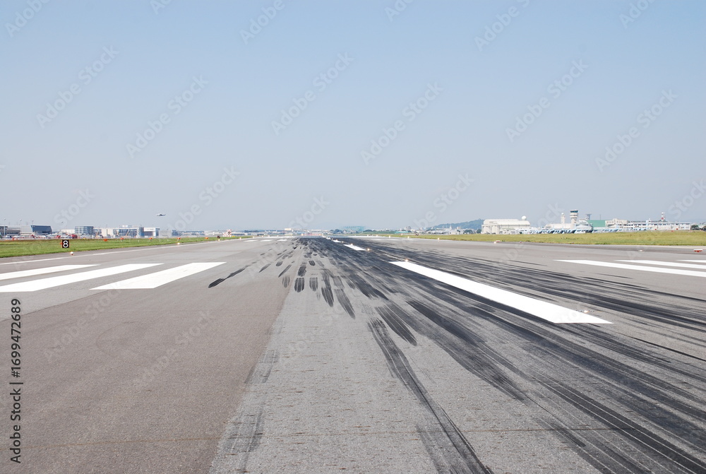 Fototapeta premium Runway Tire Marks and Threshold Markings