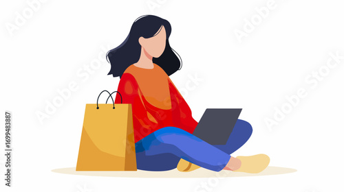 Woman sitting with laptop and shopping bag