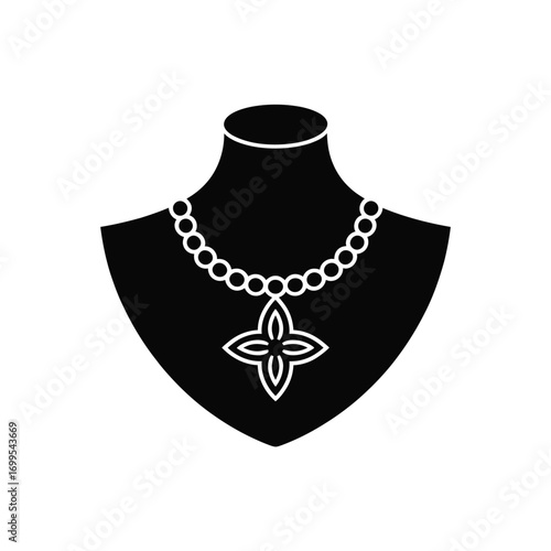 Black mannequin display with white beaded necklace and floral pendant jewelry beads
