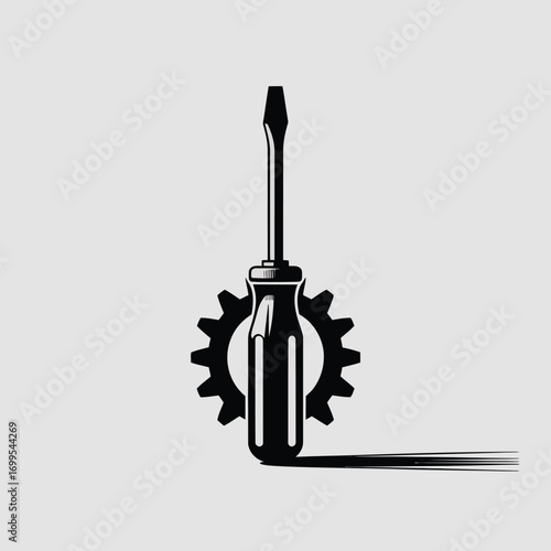 Black screwdriver and cogwheel with shadow gear tool
