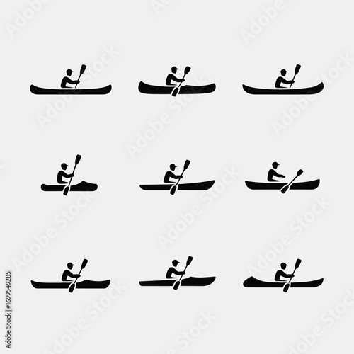 Kayakers paddling in canoes on water kayaking canoeing