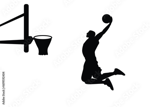 Silhouette of a basketball player in a jumping pose, isolated on a background.