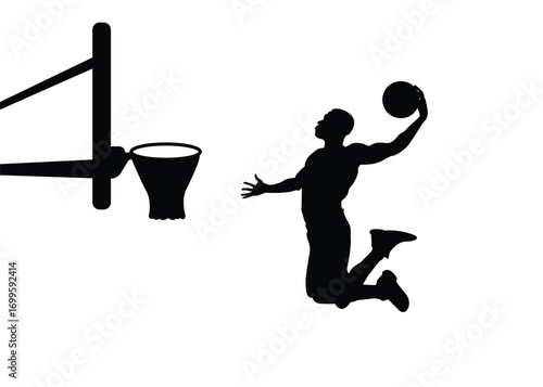 Silhouette of a basketball player scoring in a jumping pose, isolated on a background.
