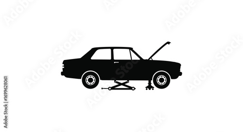 a car silhouette with open hood and jack underneath