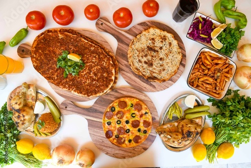 Wallpaper Mural Delicious meat kebab with fresh vegetable salad served with variety of Turkish dishes and appetizers. Top view of assorted Turkish food and meze, tasty and healthy Mediterranean cuisine. Top view. Torontodigital.ca