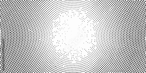 Abstract radial halftone pattern with black dots on a white background creating a sense of movement and expansion