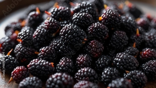 Black mulberries in a bowl