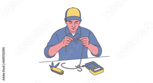 Male technician repairing an electrical cable at a workbench.