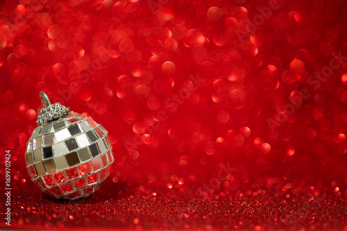 Christmas decoration on a shiny red background