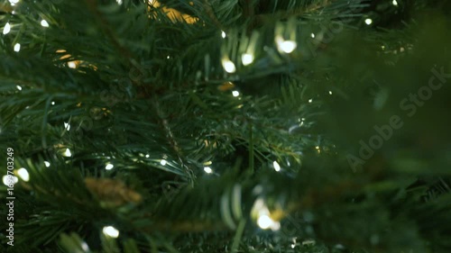 Beautiful decorative christmas tree with garland. 4k video footage