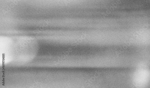 Gritty pattern and abstract wave gradient with grainy overlay. Monochrome background featuring noise stipple, sand halftone texture, and digital grain glitch art.