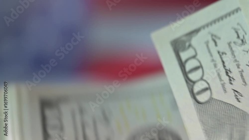 Man counting money. Dollar banknotes in hands with usa flag on background. 4k footage UHD 3840x2160