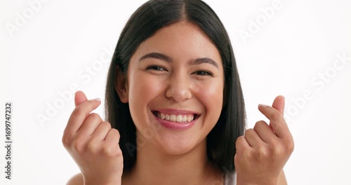 Wallpaper Mural Girl, heart fingers and face in studio with smile, mockup space and beauty on white background. Woman, model and symbol for love, kindness or happy with gesture in portrait for skincare in Portugal Torontodigital.ca