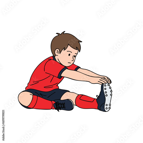 Young boy in red soccer uniform stretching his leg touching his toes preparing for sport.