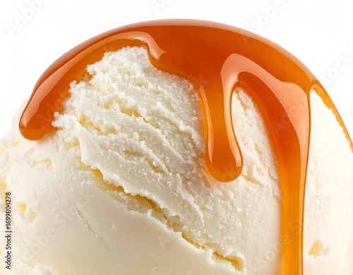 Caramel Sauce Pouring on Vanilla Ice Cream Isolated on White