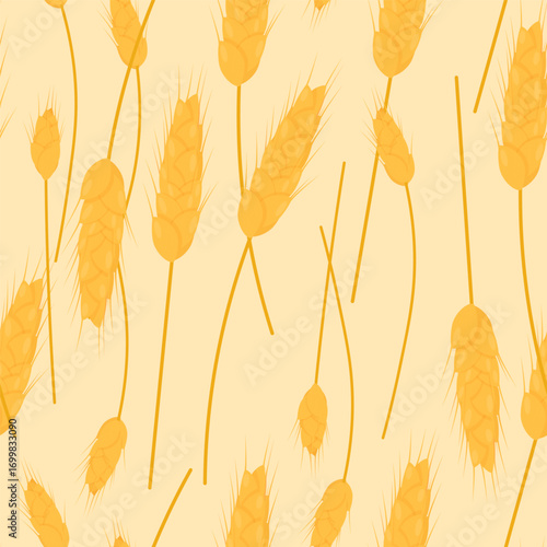 Seamless pattern of wheat ears on a light yellow background