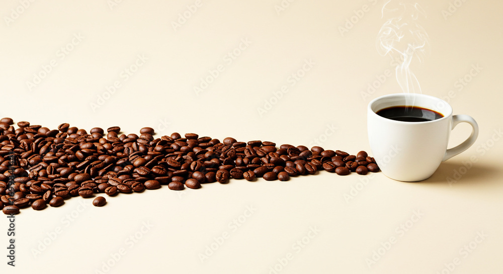 Naklejka premium Coffee Beans Trail Leading to Cup with Copy Space