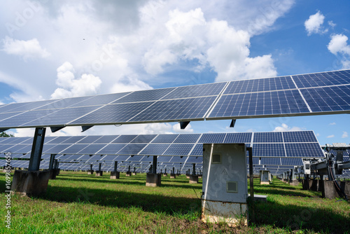 Large-scale monocrystalline solar panel array with ground-mounted structures, engineered for efficient electricity generation in utility, commercial, and industrial applications