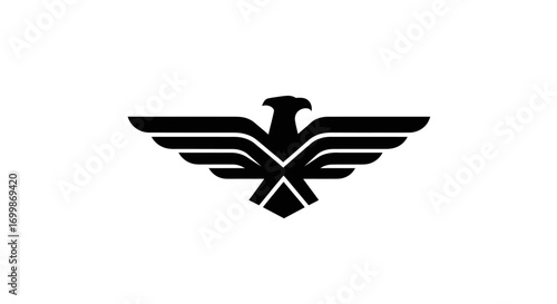 Stylized black eagle logo with spread wings a symbol of power and freedom.