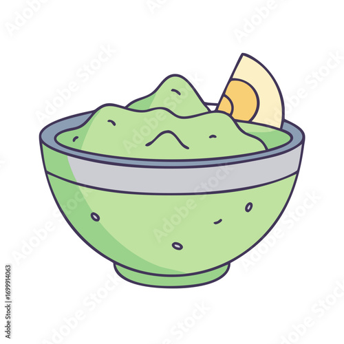 Bowl of fresh guacamole with a crispy tortilla chip ready to eat