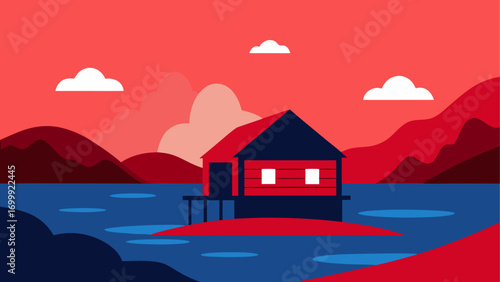 House on stilts at sunset by the water