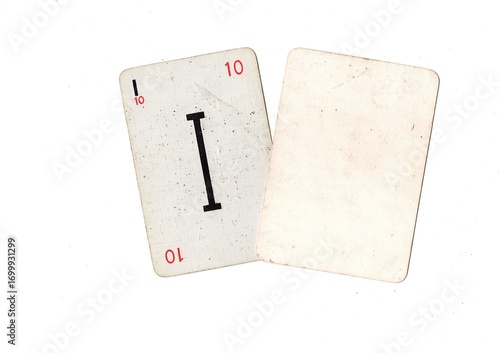Foto A grubby vintage alphabet playing card and a blank card with space for text or copy