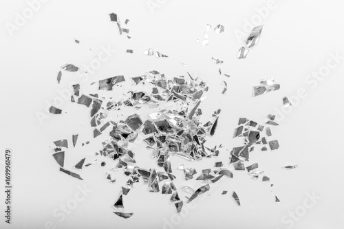 A shattered mirror on a white background