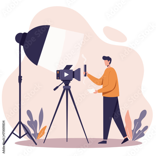Male photographer adjusting camera and lighting setup in studio  