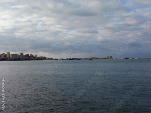 Mediterranean Sea Waves at Sunset – Alexandria Skyline