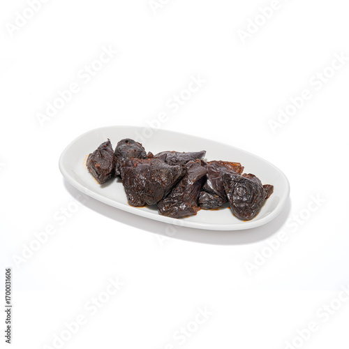stuffed eggplant served on a long plate. stuffed eggplant. A plate of stuffed eggplant on a white background. stuffed eggplant in Turkish cuisine.
