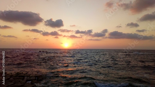Mediterranean Sea Waves at Sunset – Alexandria Skyline