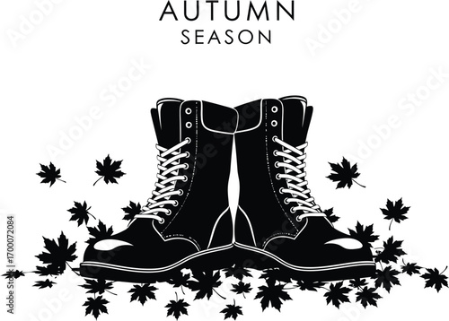 Autumn season boots with fallen leaves pair of leather boots with laces and maple leaves