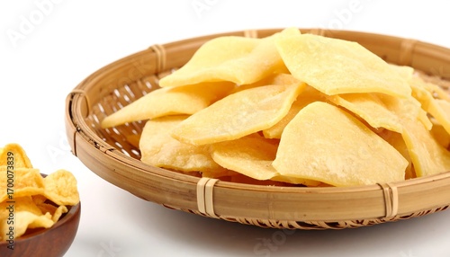 Dried fruit slices in a bamboo colander