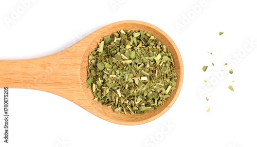 Dried herbs in a wooden spoon (1)