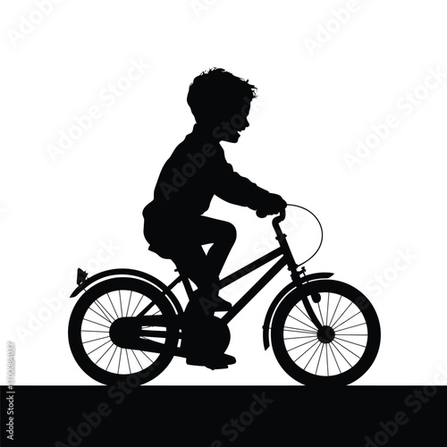 Silhouette of a Joyful Child Riding a Bicycle Outdoor Fun