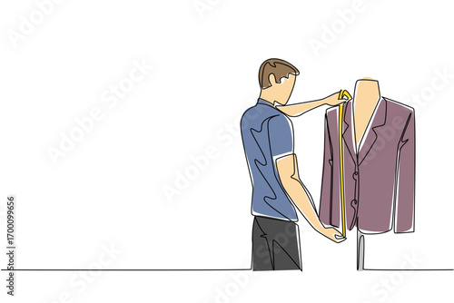 A young man tailor adjusts a stylish jacket on mannequin in single line drawing style, symbolizing business concept of custom fashion and honoring craftsmanship on National Tailors Day.