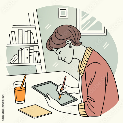 Person using tablet and laptop at the same time, with glass of tropical juice on table.
