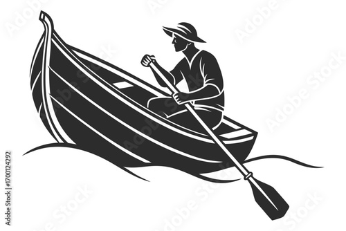 Silhouette of a person rowing a boat on the water