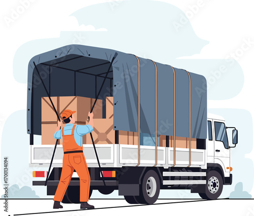 Delivery worker securing cargo on a tarpcovered truck.