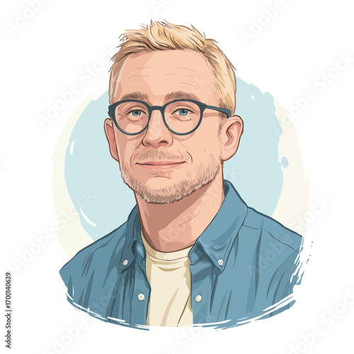 Young man with light blonde hair and glasses smiles warmly, wearing a blue shirt over a white t-shirt. He stands against a soft, light backdrop, creating a friendly atmosphere.