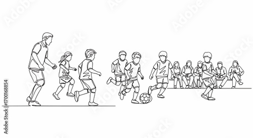 A group of children playing soccer on a field with spectators watching from the sidelines.